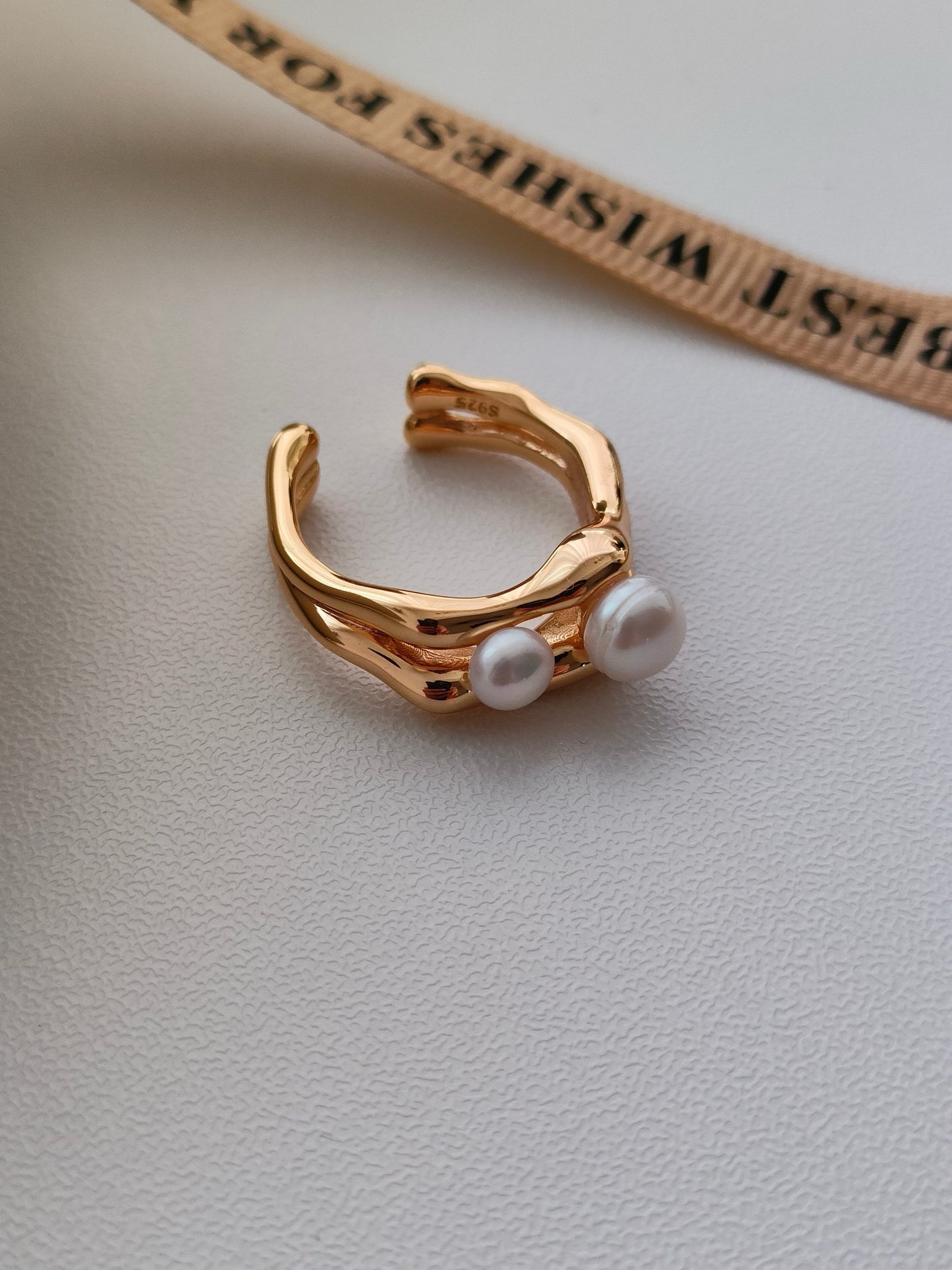 Large And Small Pearl Rings