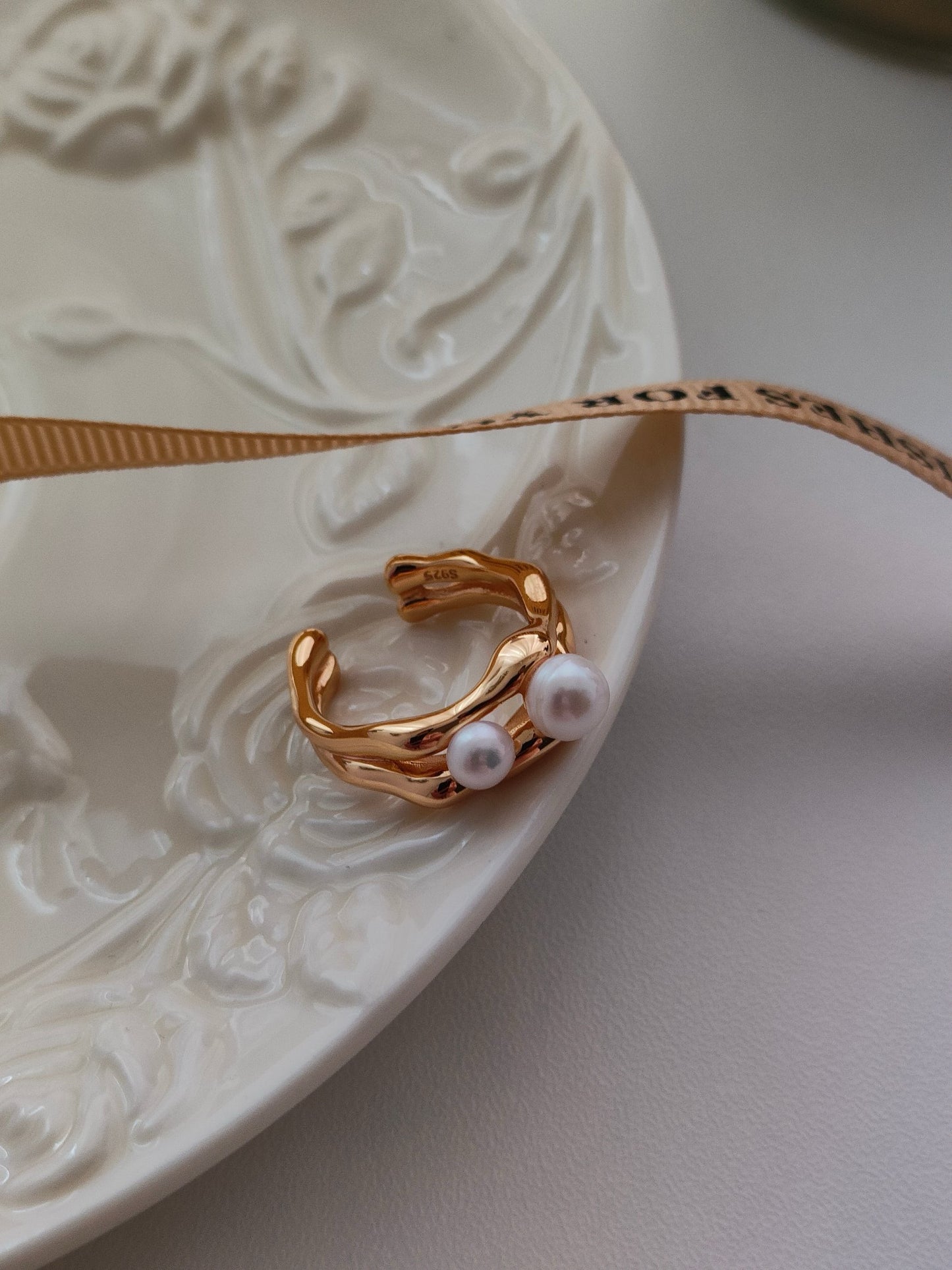Large And Small Pearl Rings